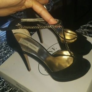 Black suede and gold t-strap shoe